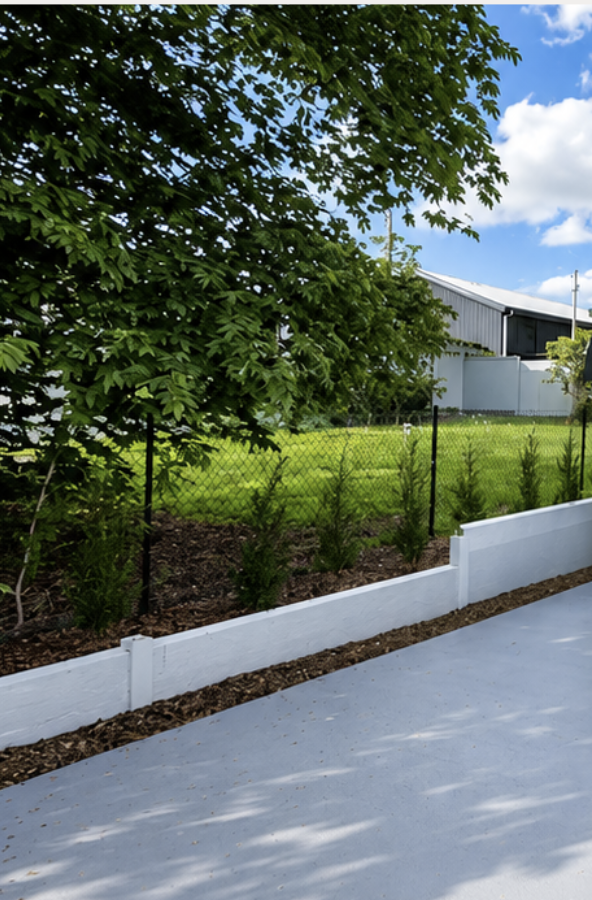 Concrete sleeper retaining wall built by Stonebuilt Projects